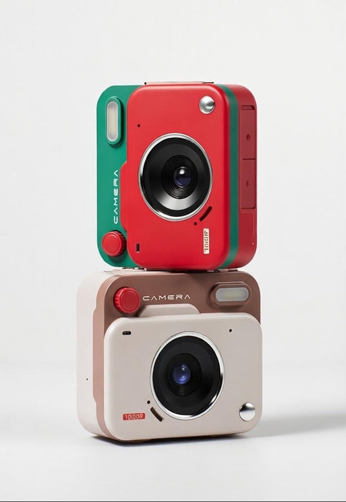 Two small cameras, one red and green, the other beige and black, on a white background.