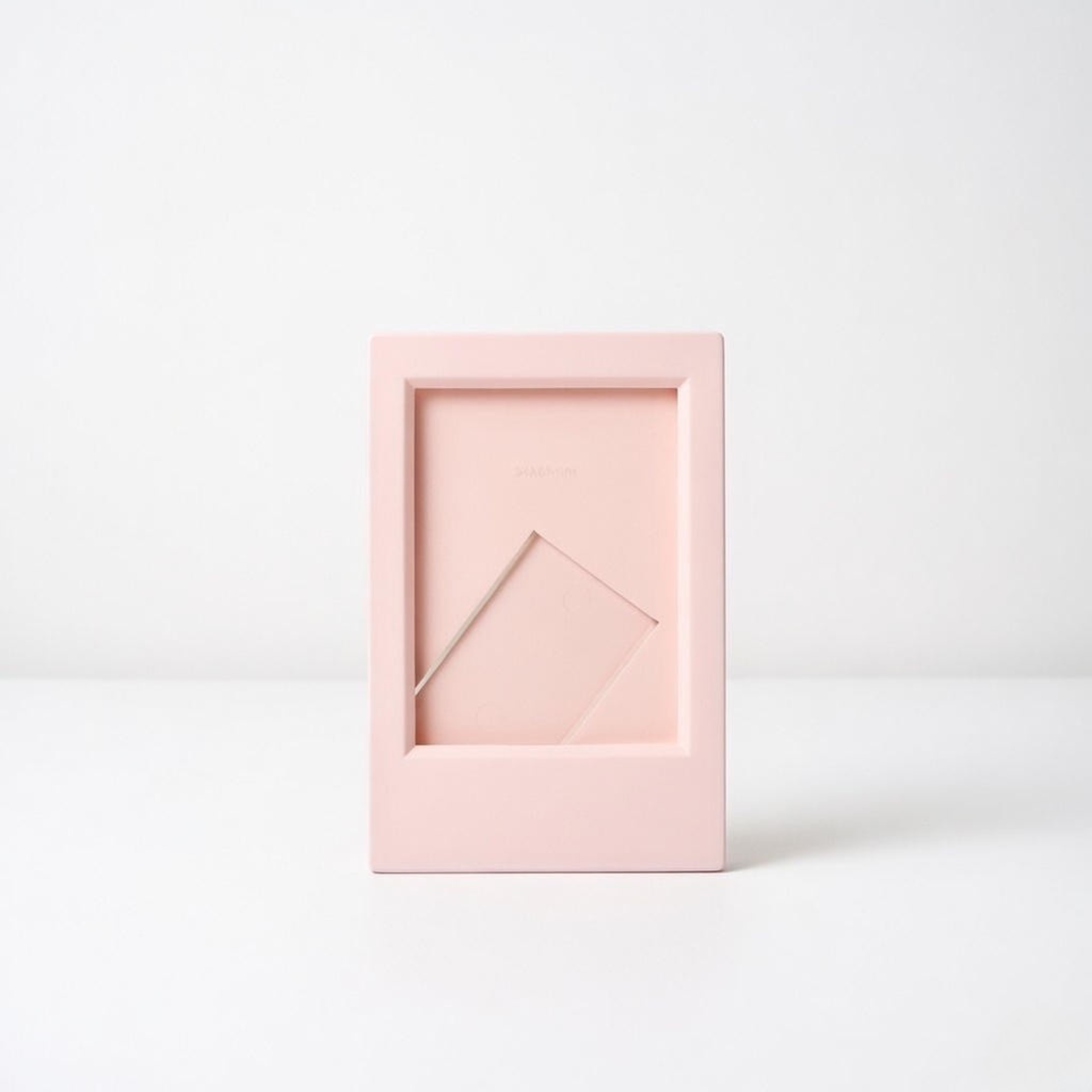 Pink mini picture frame on a white background